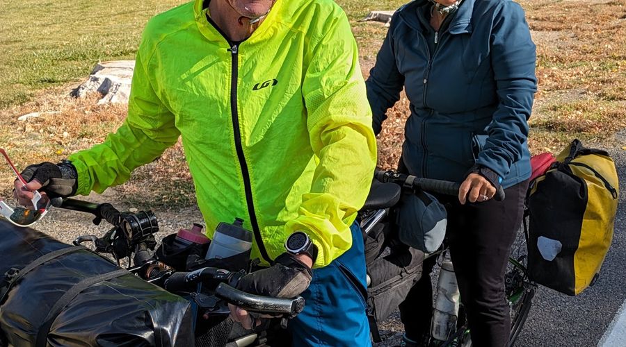 Randy Fay and wife Nancy on loaded tandem bicycle
